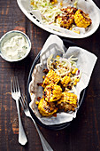 Sweet and sour corn on the cob with coleslaw and ranch dressing