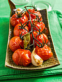 Oven-baked tomatoes with garlic
