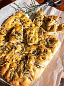 Onion focaccia and aromatic herbs