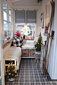 Benches and wintry decorations in porch