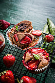 Chocolate muffins with strawberries