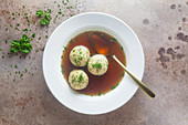 Clear beef broth with bread dumplings