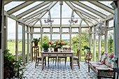 Dining table in conservatory with panoramic view