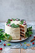 Ginger cake layred with vanila mascarpone cheese icing decorated for Christmas