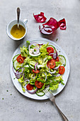 Mixed salad with tomatoes and red onions