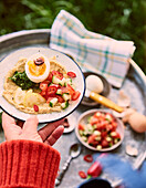 Hummus with a hard boiled egg and Greek salad