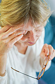 Woman suffering from headache