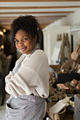 Portrait confident female shop owner