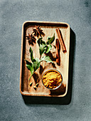 Indian or pakistani masala powder and spices on wooden tray