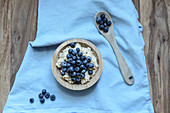 Porridge with fresh blueberries, bananas and rice drink