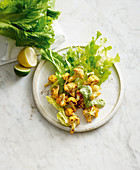 Endive salad with vegan aioli and cauliflower 'wings