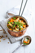 Spring vegetable stew with noodles and kohlrabi pesto