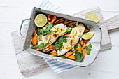 Fish with nut crust and spring vegetables