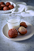 Madeleines served with a glass of milk