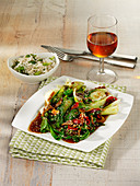 Steamed pak choi with chilli and sesame seeds