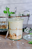 Calvados mousse with hazelnuts and biscuit crumbs