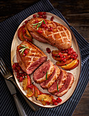 Duck breast with cranberries, apple and honey
