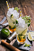 Mojito cocktails with ice and mint leaves