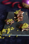 Chocolate marzipan sandwich cookies with pistachios (Christmasy)