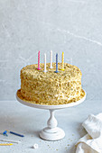 Honey cake with candles for birthday