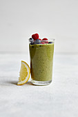 Chard and avocado smoothie with berries and dates