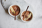 Chocolate and banana bowls with cashew nuts and hemp seeds
