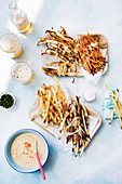 Vegan loaded root vegetable fries with beer and mustard sauce