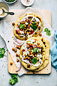 Naan bread with roasted chickpeas and sour cream