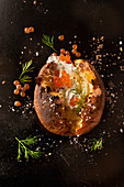 A baked potato with keta caviar