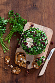 Cheese ball with herbs, cranberries and mushrooms