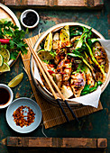 Dumplings with pak choi in a steamer basket