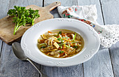 Chicken soup with pancake noodles