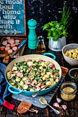Gnocchi with sausage and veggies in mustard sauce