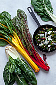 Swiss chard in different colors and chard in a pan