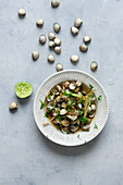 Cockles with lemongrass and lime in broth