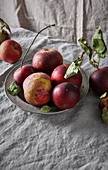 Apples in pewter dish