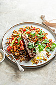 Miso roasted baby aubergines with lentil and giants couscous salad