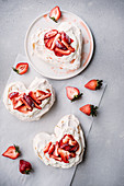 Heart shaped pavlova with strawberries