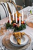 Festively set table with Advent wreath