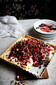 Pie with blood orange, pomegranate and pistachios