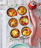 Sunday eggs with ham and peppers in a muffin pan