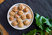 Baked beef balls with cheese and nuts