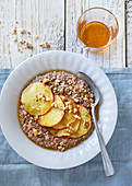 Buckwheat and chocolate porridge with honwy apples and nuts