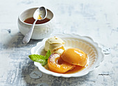 Hot peaches with vanilla ice-cream