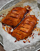 Marinated duck breast on paper