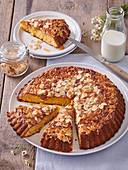 Marzipan cake with creamy caramel and almonds