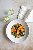 Pulled duck leg with kale and pumpkin