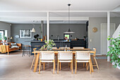 Open living room in Scandinavian style with grey walls