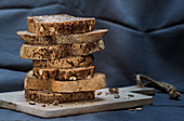 A stack of various slices of bread