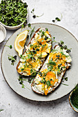 Smashed 7 minute eggs on toast with herbs and mayonaisse